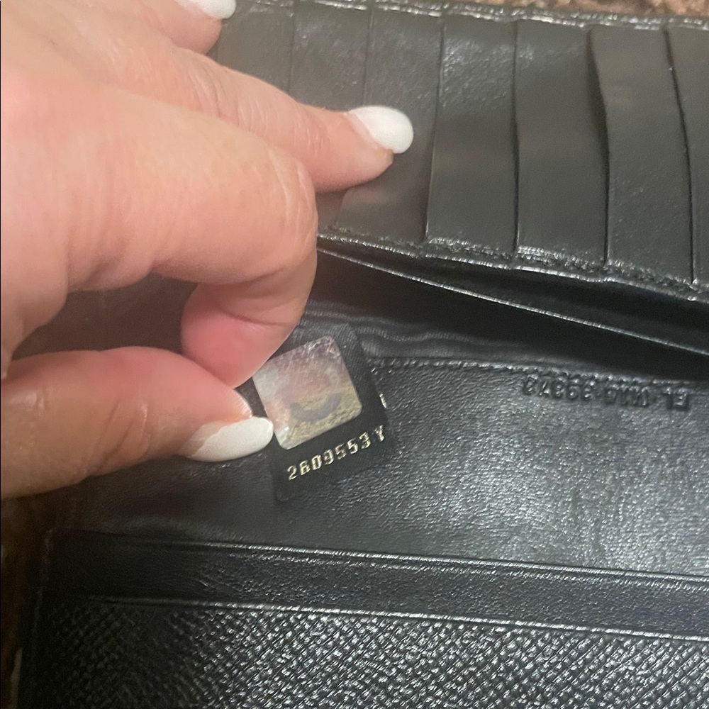 Bulgari Black Wallet with Gold Ring Detail - Picture 9 of 14